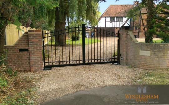 S-Top Metal Driveway Gates with Brick Piers