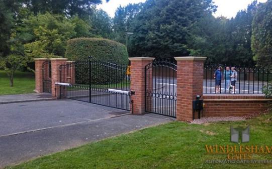 S-Top Metal Gates with Bow Top Pedestrian Gate